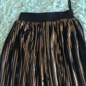 gold and black skirt